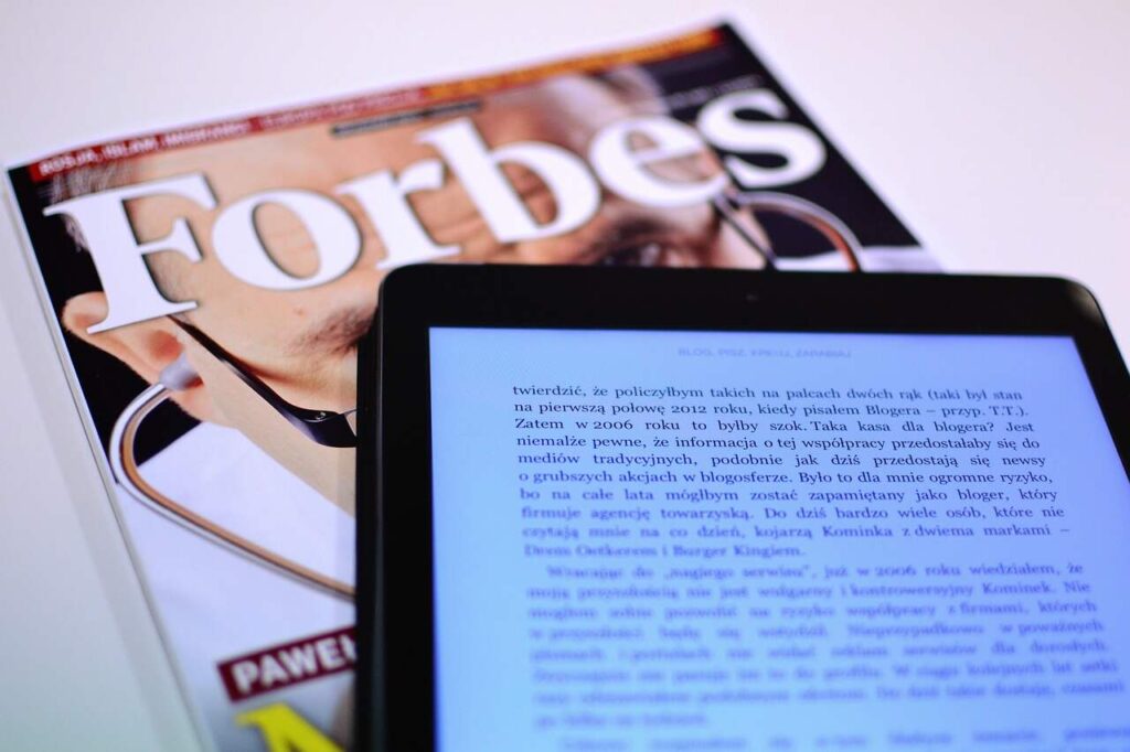 Who owns Forbes com?